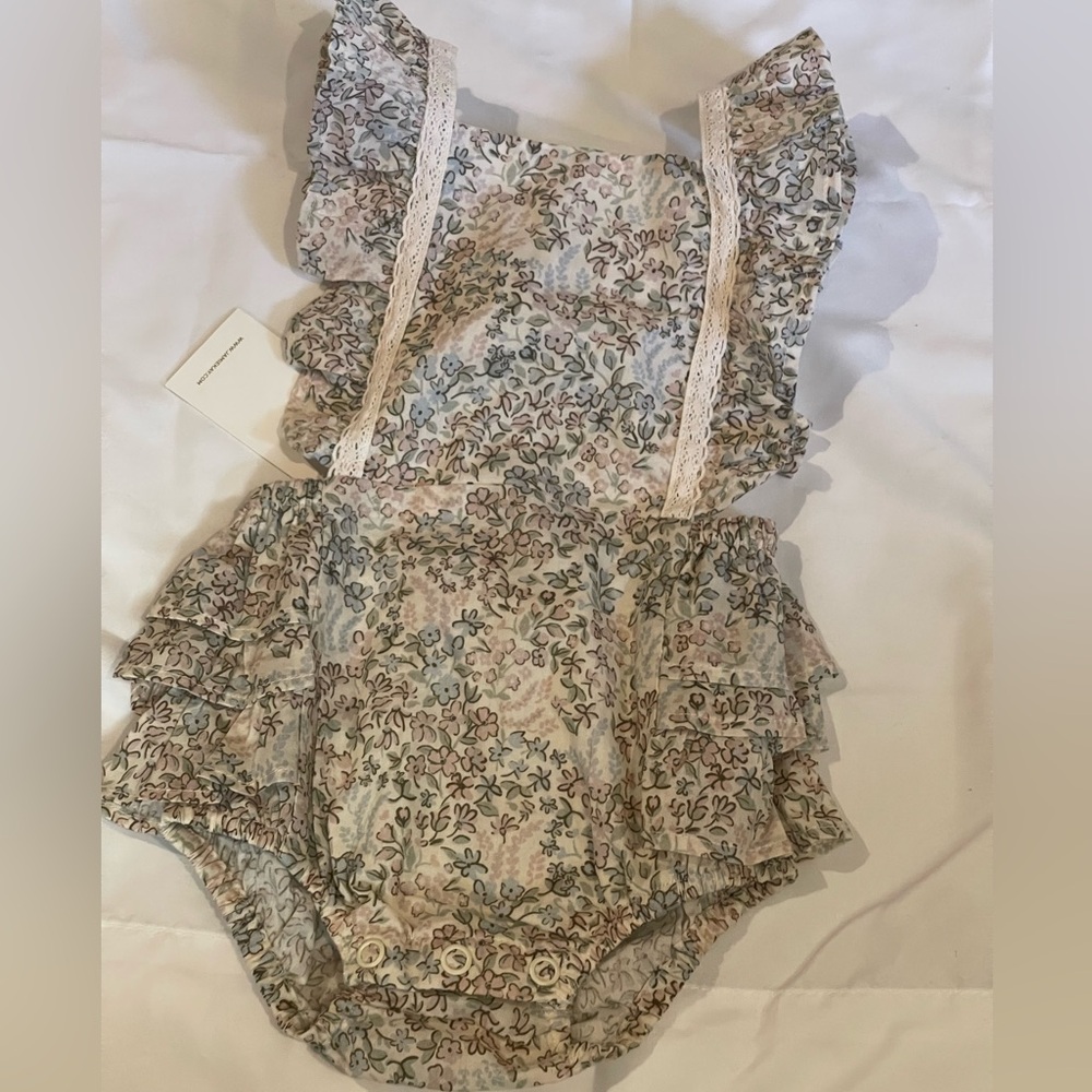 Jamie Kay onesie